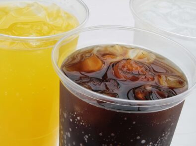 fizzy drinks in plastic beakers