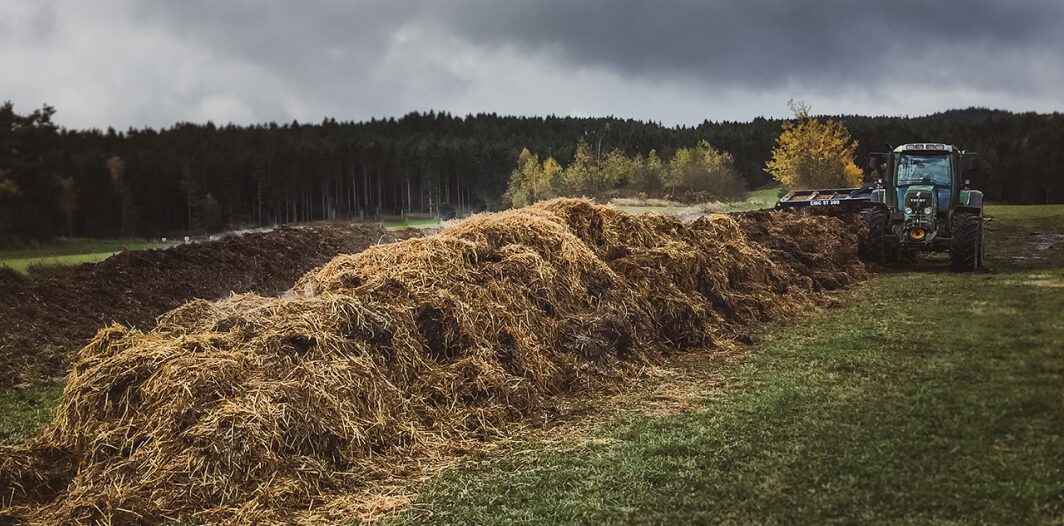 Tractor harvests hay