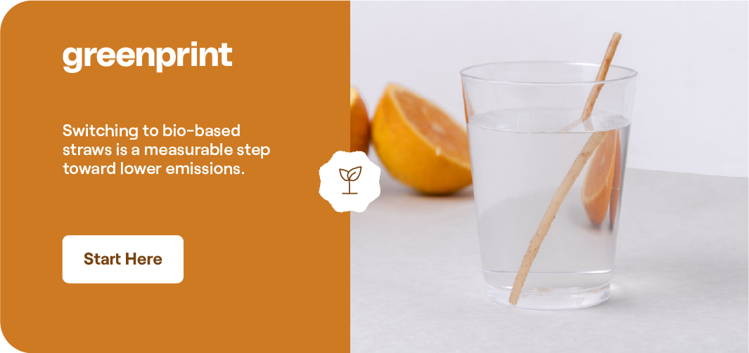 Plant-based agave straws in a glass as a lower-emission alternative to petroleum-based plastic straws