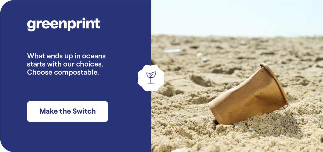 Single-use plastic cup washed up on a beach illustrating plastic water bottle pollution in the ocean